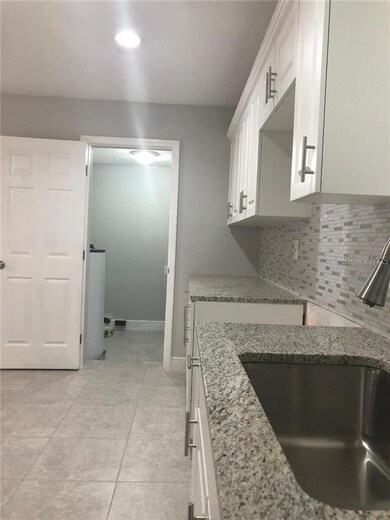 7508 Melaleuca Ln, Tampa, FL 33619 - photo 7