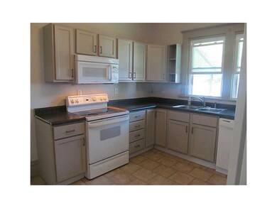 Kitchen. Lovely cabinets, new countertop, new floo