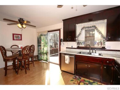 East-in space in kitchen. Sliding glass door opens
