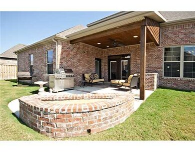 Patio/Deck. Built-in custom brick fire pit - great place for cook outs & entertaining!