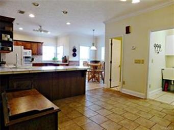 Looking at kitchen from separate dining area