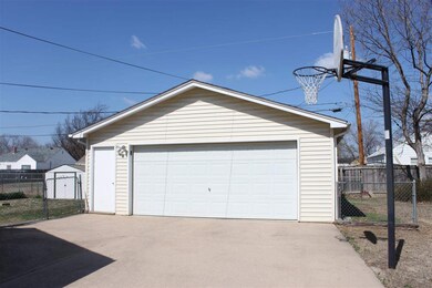 Oversized garage with automatic opener. Three wind