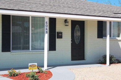 Front New Dual Pane Windows & Roof.jpg