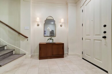 Gracious entry with tile floor, recessed niche for