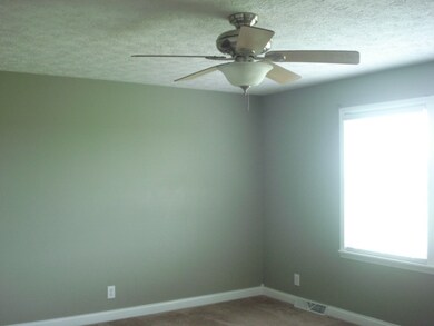 Master bedroom with walk-in closet.  Split bedroom