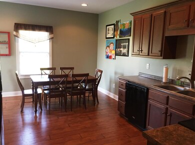 Lovely kitchen with plenty of cabinet space and a pantry.