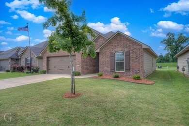 View of front of property featuring a front yard a