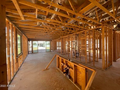 View from kitchen into great room and di