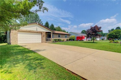 Front view of the home, oversized 4 car garage, pl