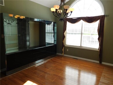 Spacious Dining Room with two pretty windows and a