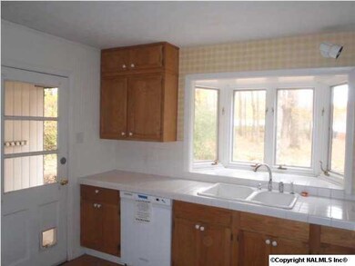 ANOTHER VIEW OF THE KITCHEN