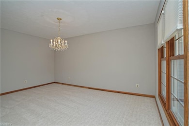 Lovely formal dining room with chandelier and new 