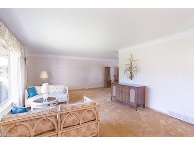 Another view of the living room leading to formal 