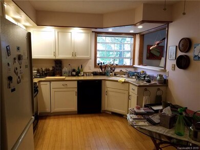 Spacious eat-in kitchen with pass-thru to dining/living