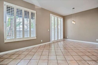 Open living and dining rooms make for ease in ente