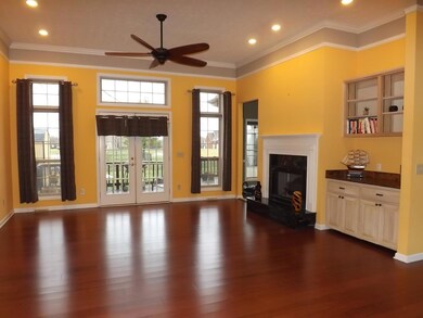 View of living room without furniture.