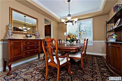 The formal dining room has built in stereo speaker