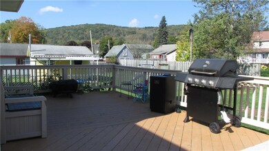 Attached deck off rear of house.