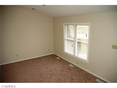 Living Room - Living room with new carpet, vaulted