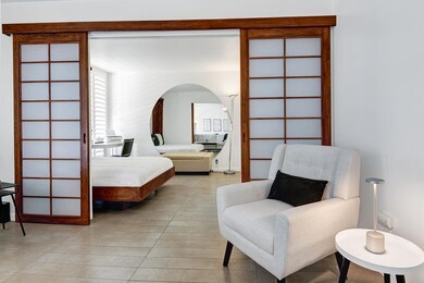 SEATING OUTSIDE BEDROOM 2.jpg mls
