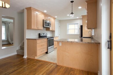 Remodeled kitchen creates flow between rooms. Soli