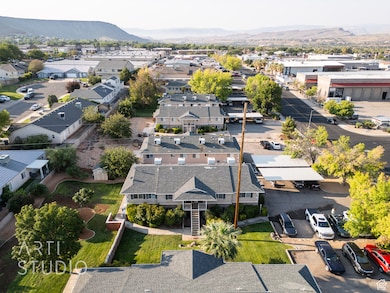 Aerial view of residential area featuring a mountainous background