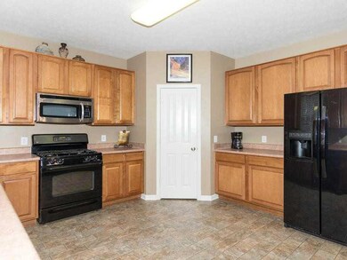 Kitchen. Plentiful cabinet and counter space as well as a large pantry.
