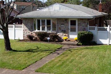 Solid built house with stone front and brick on ot
