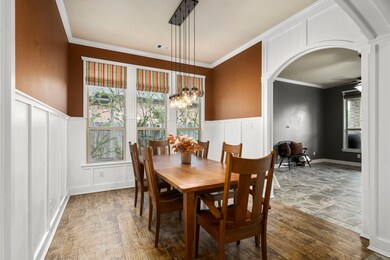 Custom wainscoting gives the true craftsman feel to this dining room.