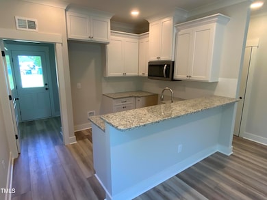 221 E Jackson St, Coats, NC 27521 - photo 3