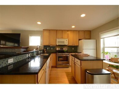 Updates in the kitchen include granite counters, t