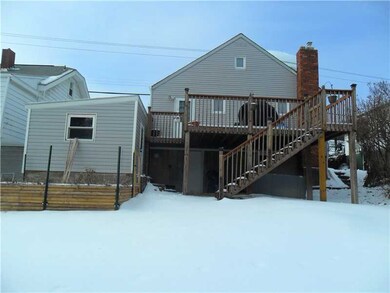 Exterior Back. Nice decking at exterior back for c