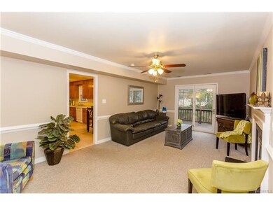 Family Room - Fireplace and access to deck