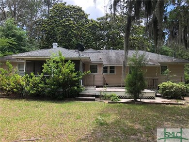 NICE ROOF LINES AND MATURE LANDSCAPING.