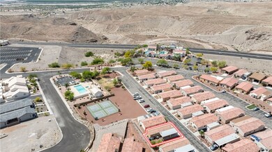 Aerial view of property and surrounding area with