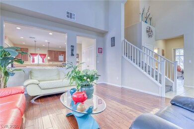 Open airy family room overlooking the island kitch