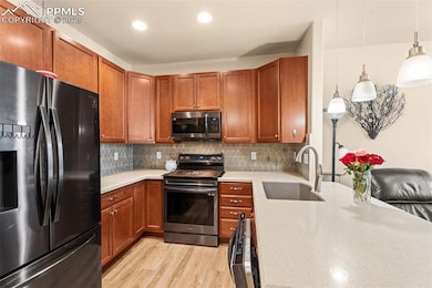 6260 Fowler Mill Point, Colorado Springs, CO 80923 - photo 3