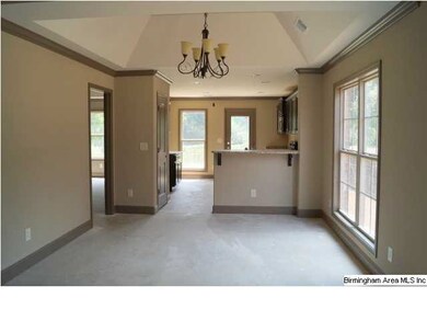 Dining Room with vaulted ceiling