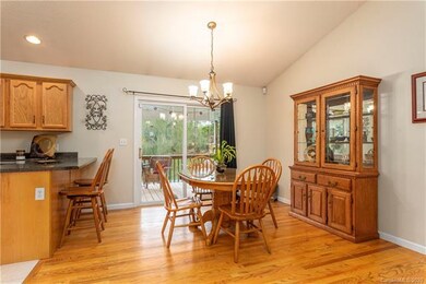 Breakfast bar and dining area with sliding door to