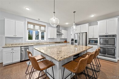 Kitchen featuring appliances with stainless steel
