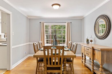 Open to the living room and off the kitchen this d