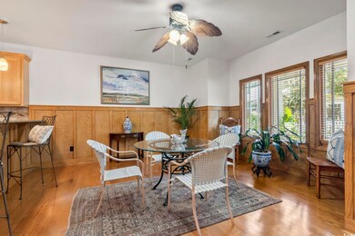 Dining room with light hardwood / wood-style floor