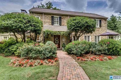 Old brick walkway to covered entry