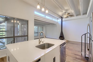 Kitchen featuring a sink, appliances with stainle