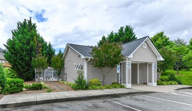Look how close to the POOL this home is! And additional parking for guests is literally right across the street. And you never need to be concerned about anything being built behind you with the greenway in your backyard!