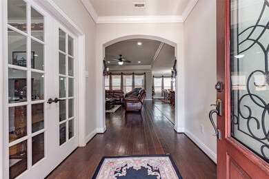 Beautiful entryway with wood flooring, high ceilin