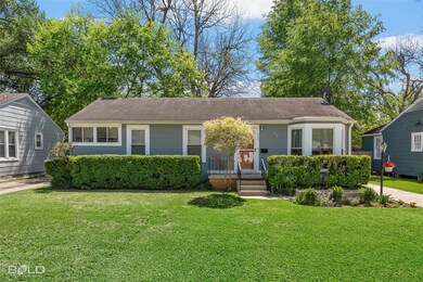 View of front of house with a front lawn