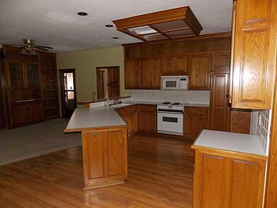 Kitchen. The kitchen and den sit just off the livi