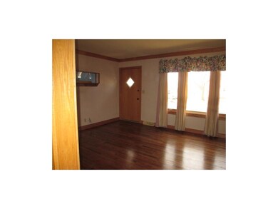Living Room with re-finished hardwood floors throu