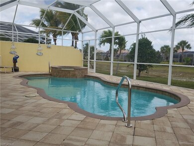 Pool with custom tile surround, and spa